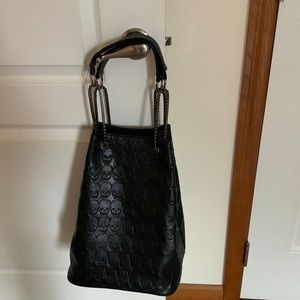 Black skull printed hand bag